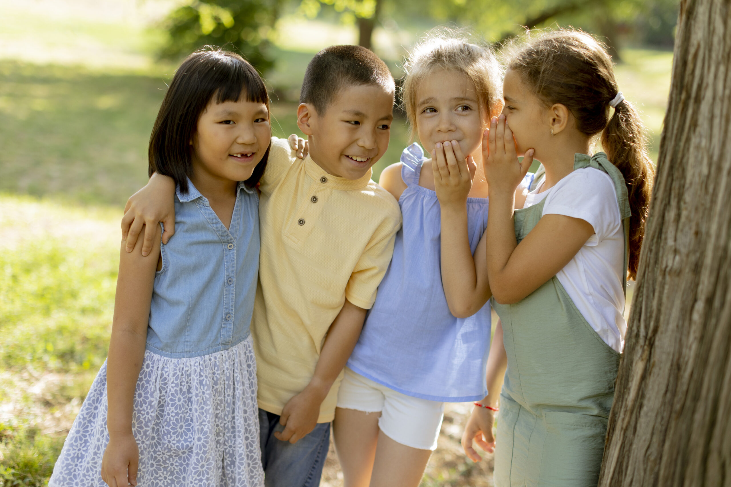 A diverse group of happy young children playing together